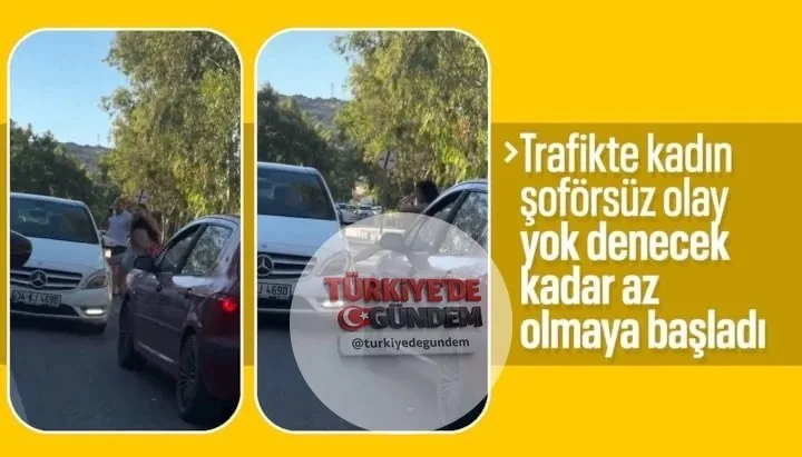 İzmir'de şerit ihlaline sinirlenen kadın sürücü otomobili tekmeledi.