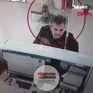 Bolu'da banka işlemi yapan bir vatandaşın başına kedi düştü.