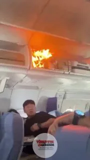 Çin'de bir yolcunun el bagajında bulunan taşınabilir şarj cihazı, saniyeler içinde alev aldı.