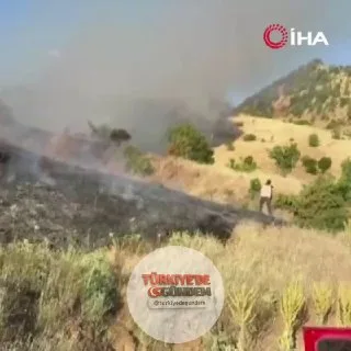 Malatya'nın Doğanyol ilçesindeki ormanlık alanda çıkan yangına ekiplerin müdahalesi sürüyor.